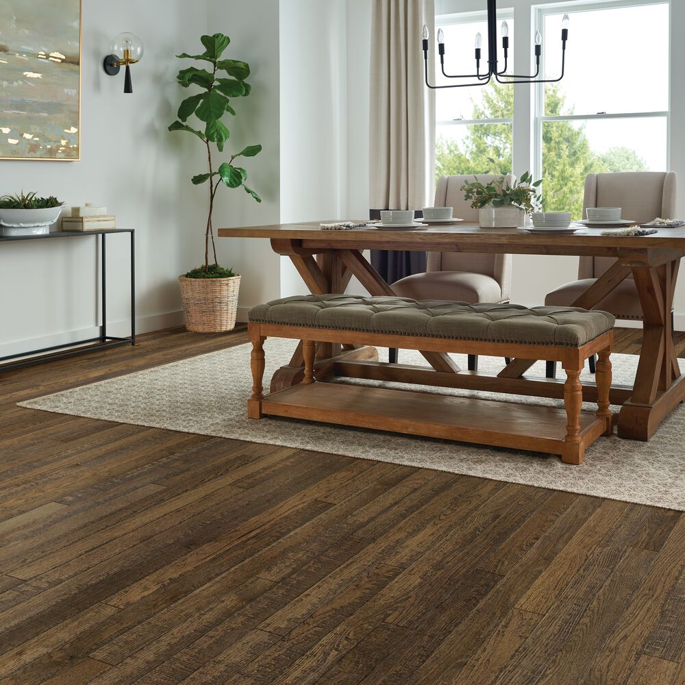 dining room with barnwood flooring